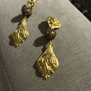 Gold clip on earring